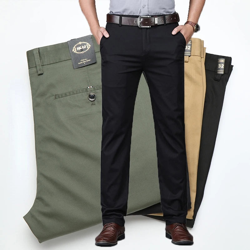 Three pairs of pants in green, black, and beige with a person wearing black pants.
