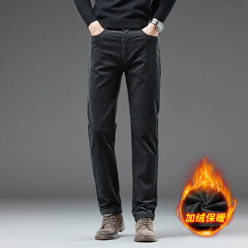 Person wearing black pants with a fiery graphic and text on a gray background