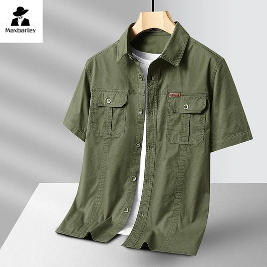 Green short-sleeve shirt on a hanger with Maxbarley branding.