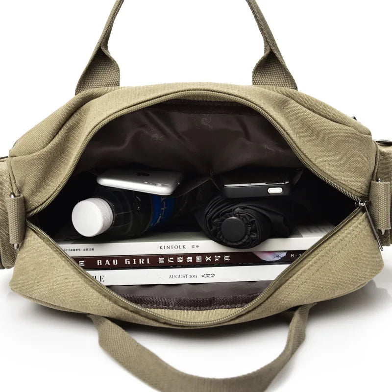 Open beige bag with books, a water bottle, and a camera inside on a white background