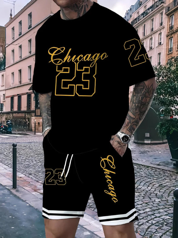 Person wearing a black 'Chicago 23' t-shirt and shorts on a city street.
