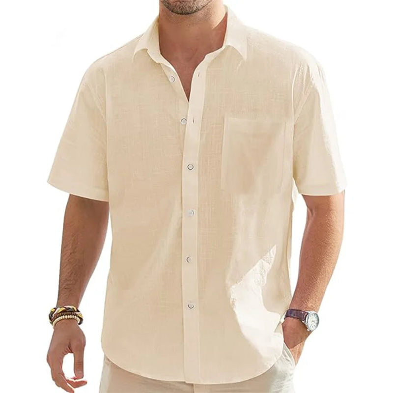Man wearing a beige short-sleeve shirt on a white background