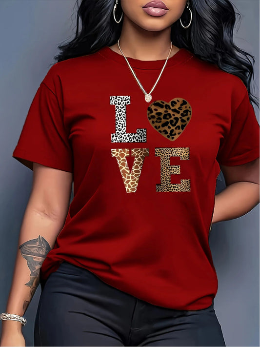Person wearing a red t-shirt with 'LOVE' printed in leopard print.