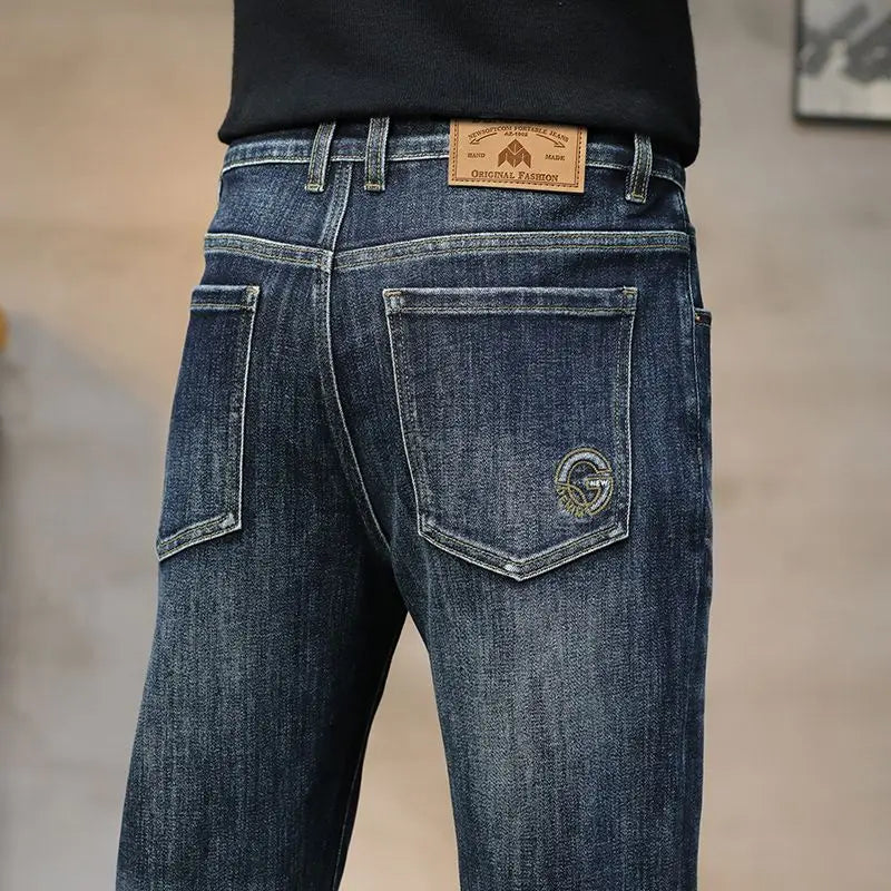 Blue jeans with brand logo on a blurred background