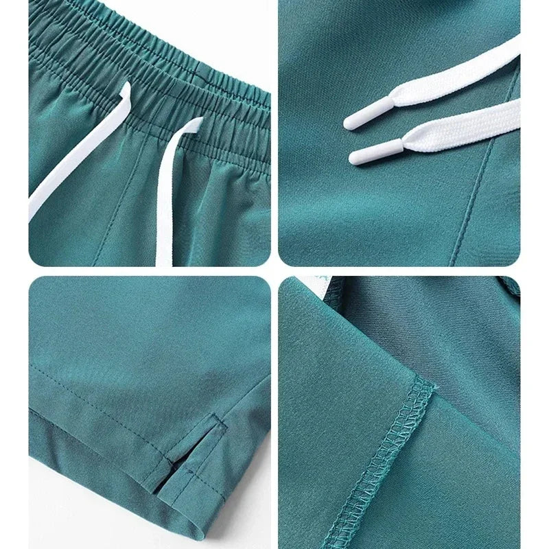 Teal shorts with white drawstring and stitching details on a white background