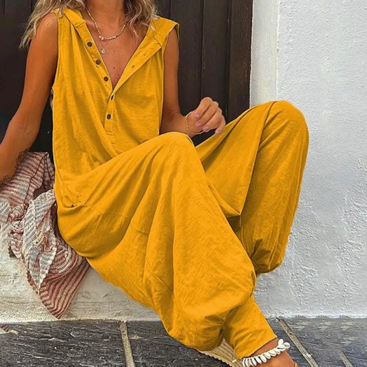 Person wearing a yellow outfit sitting on a step.