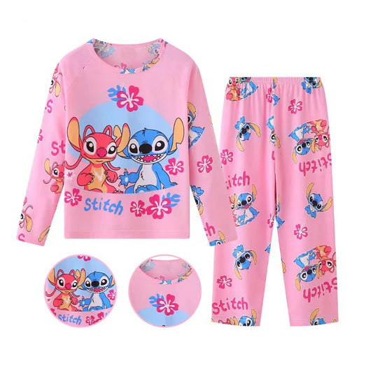 Pink children's pajama set with cartoon characters on a white background