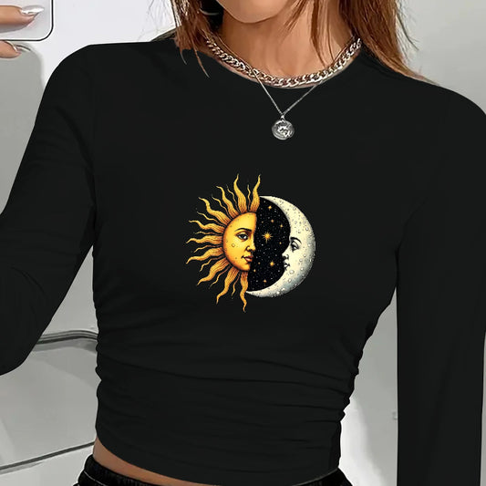 Black long-sleeve shirt with sun and moon design worn by a person.