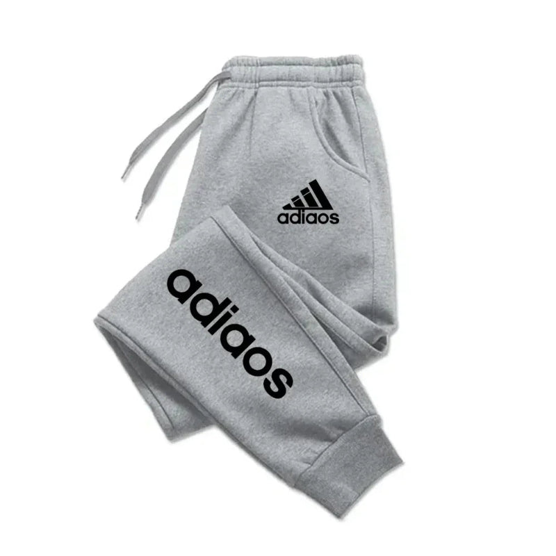 Gray Adidas tracksuit on a white background