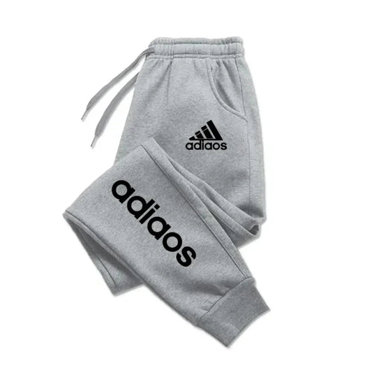 Gray Adidas tracksuit on a white background