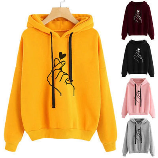 Yellow hoodie with black graphic design on a white background, with additional color options displayed below.
