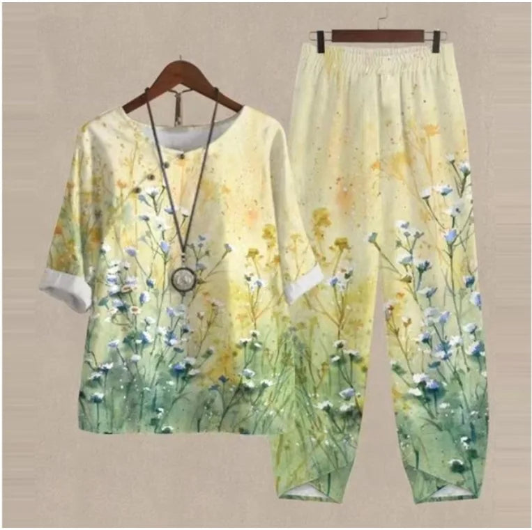Floral printed outfit on a hanger against a beige background