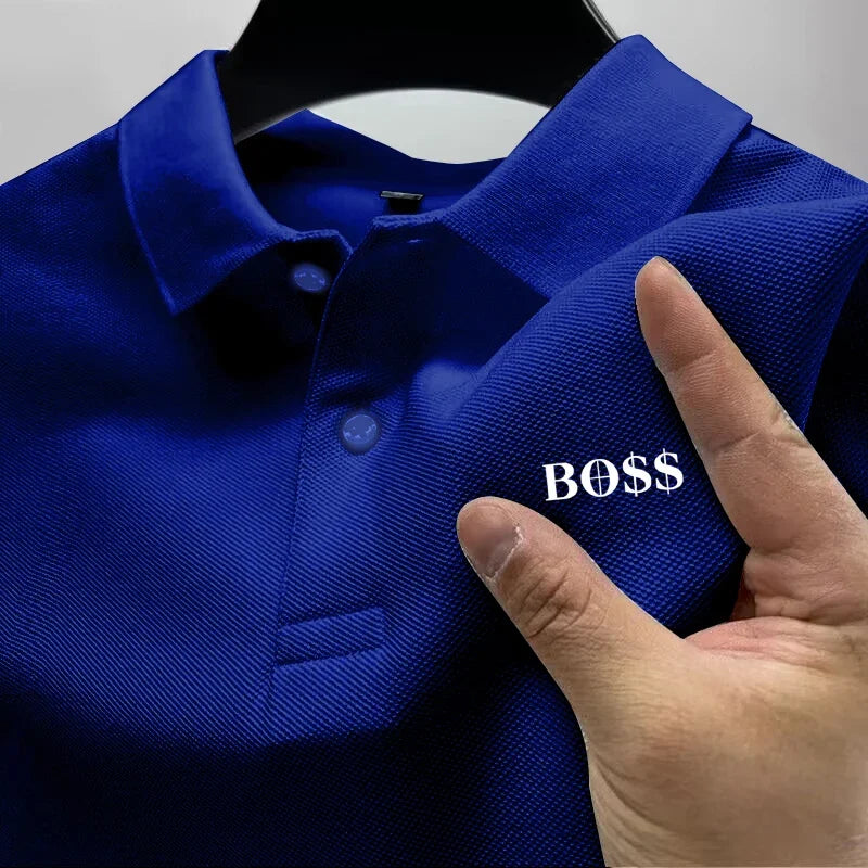 Blue polo shirt with 'BOSS' text on a hanger, hand pointing to the text.