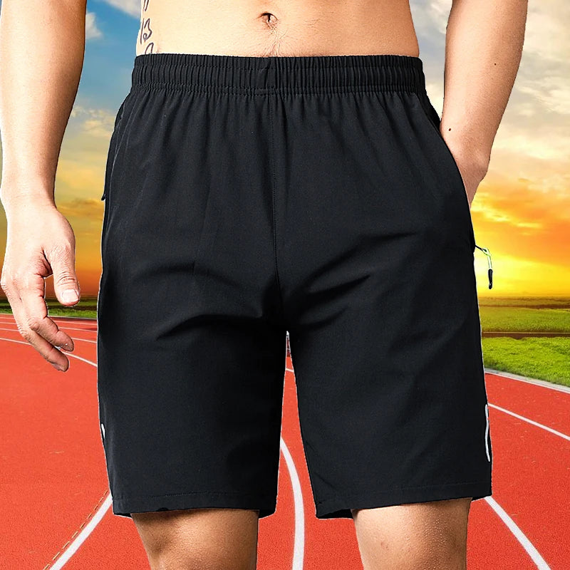 Person wearing black shorts with a scenic background