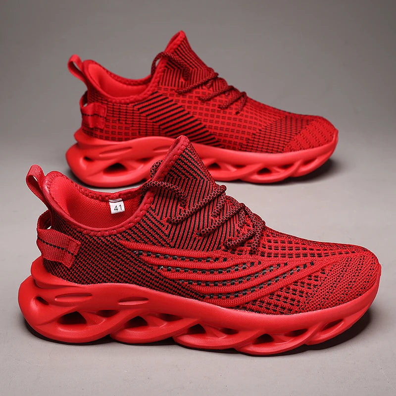 A pair of brown and gray COMFYTRIP running shoes with mesh upper and a unique sole design, displayed against a neutral background.