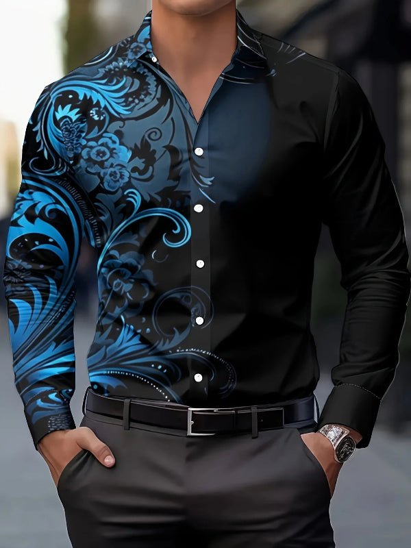 Black shirt with blue floral pattern worn by a person, blurred background