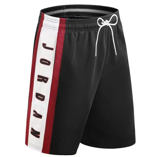 Black shorts with a red and white stripe featuring the Jordan logo on a white background