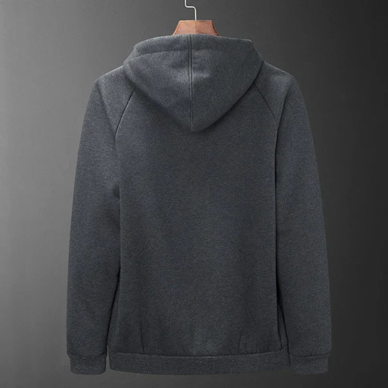 Gray hoodie on a hanger against a gray background