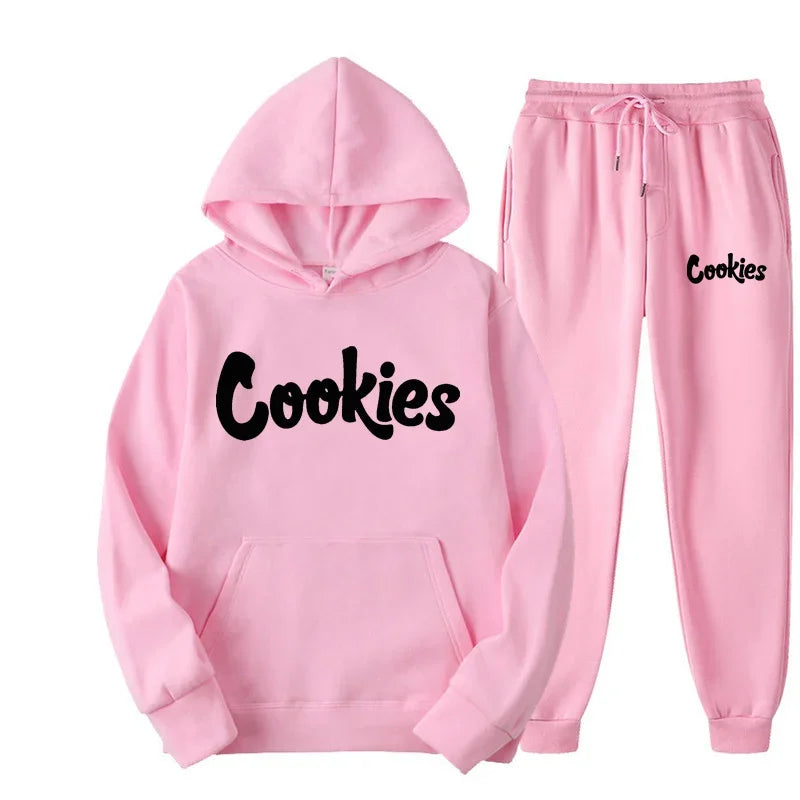 Pink 'Cookies' hoodie and pants set on a white background