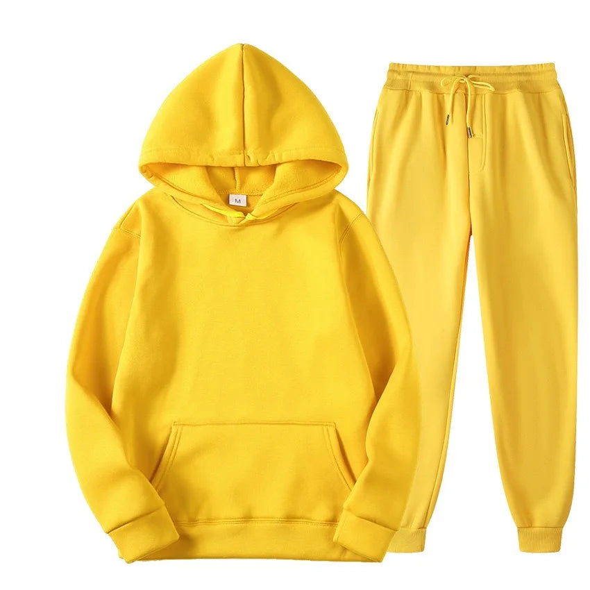 Yellow hoodie and pants set on a white background