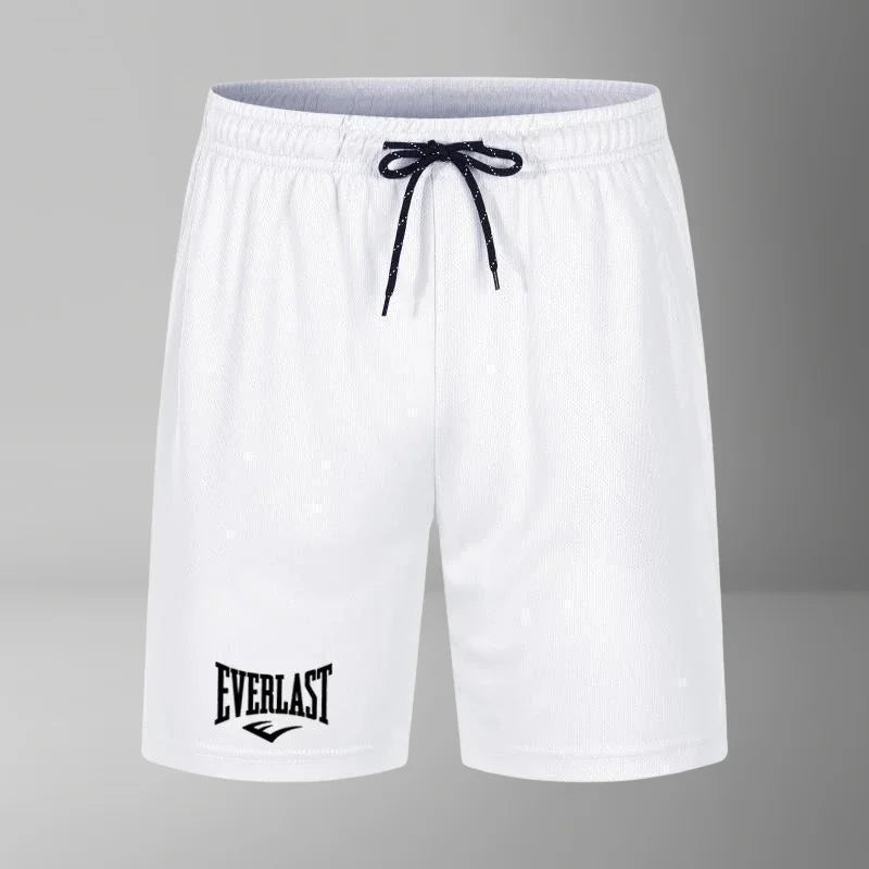 White shorts with a black drawstring and 'Everlast' logo on a gray background