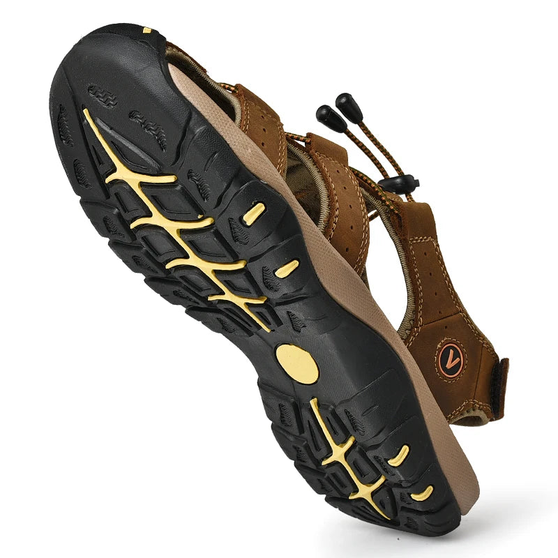 Black and brown sandal with yellow accents on a white background