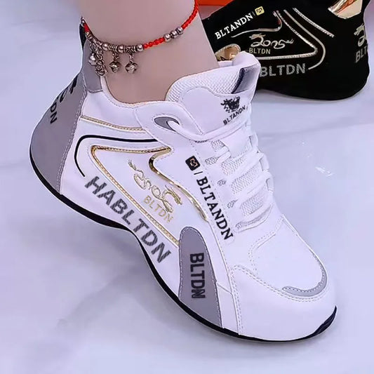 White high-top sneaker with branding on a light gray background