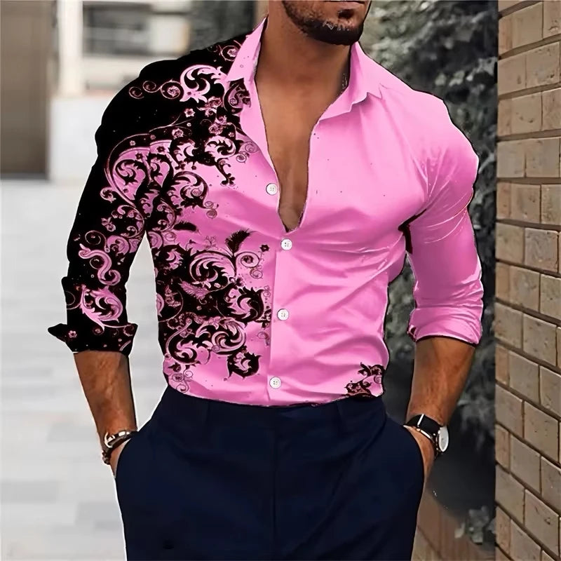 Man wearing a pink shirt with black floral patterns outdoors.