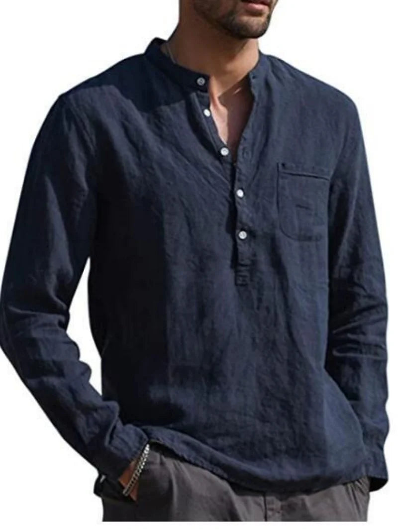 Navy blue long-sleeve shirt worn by a person on a white background