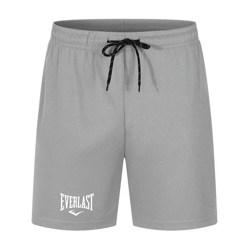 Gray shorts with a black drawstring and 'Everlast' logo on a white background
