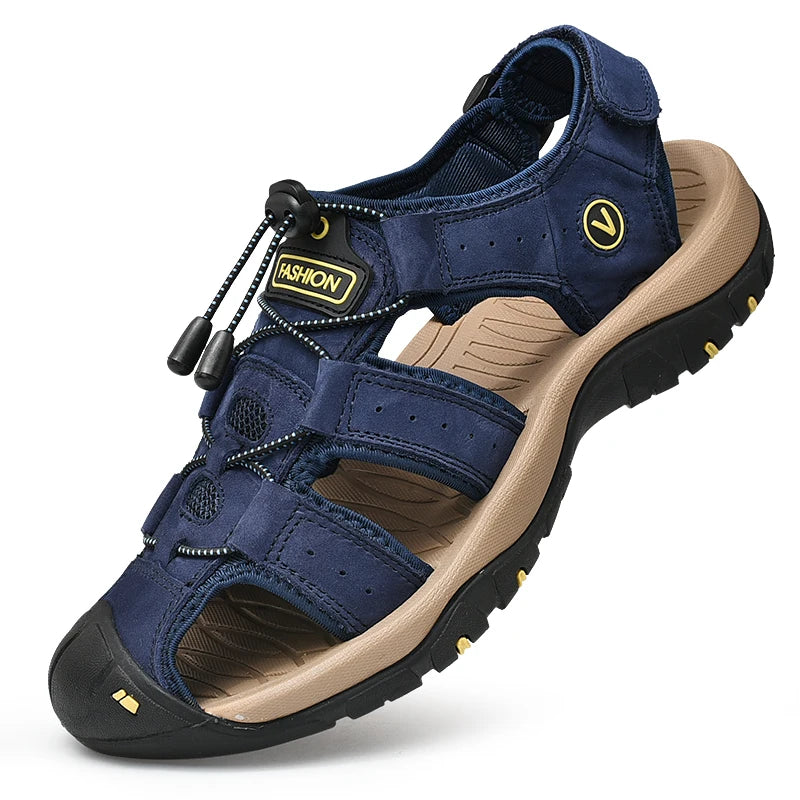 Navy blue sandal with tan insole and black sole on a white background