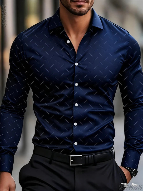 Man wearing a blue patterned shirt with a blurred background