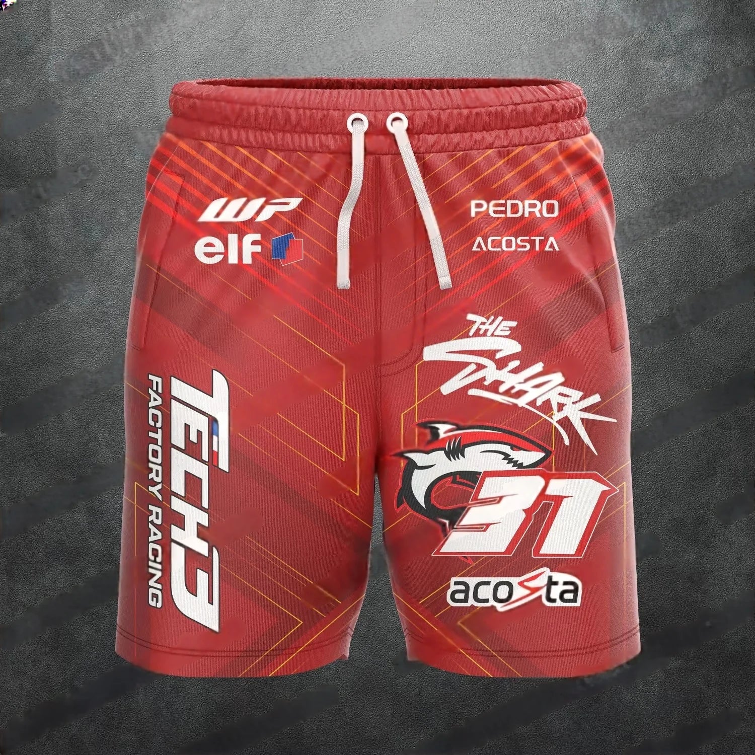 Red shorts with various logos on a dark background