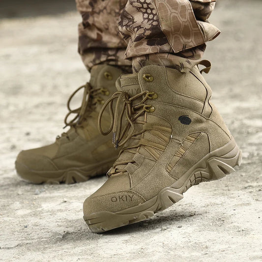 Tan tactical boots with laces and 'OKIY' branding on a textured surface.