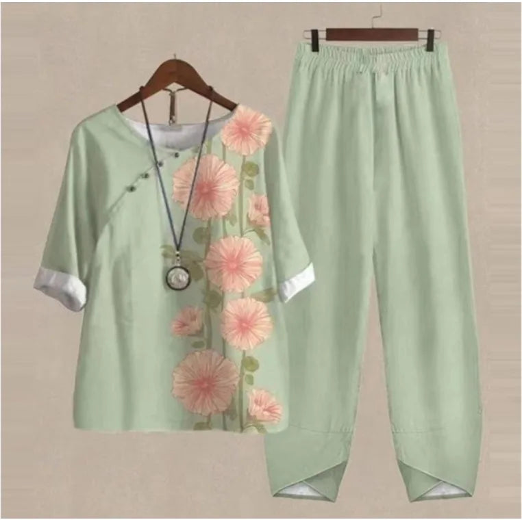 Light green outfit with floral patterns on a beige background