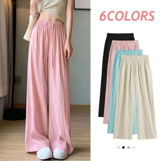 Person wearing a pink wide-leg pants with color options displayed on the right.