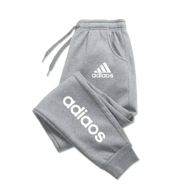 Gray Adidas tracksuit on a white background