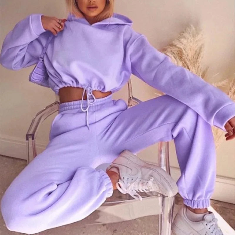 Women’s fashion two-piece sportswear set with long sleeves and high-waist casual pants in neutral tones purple
