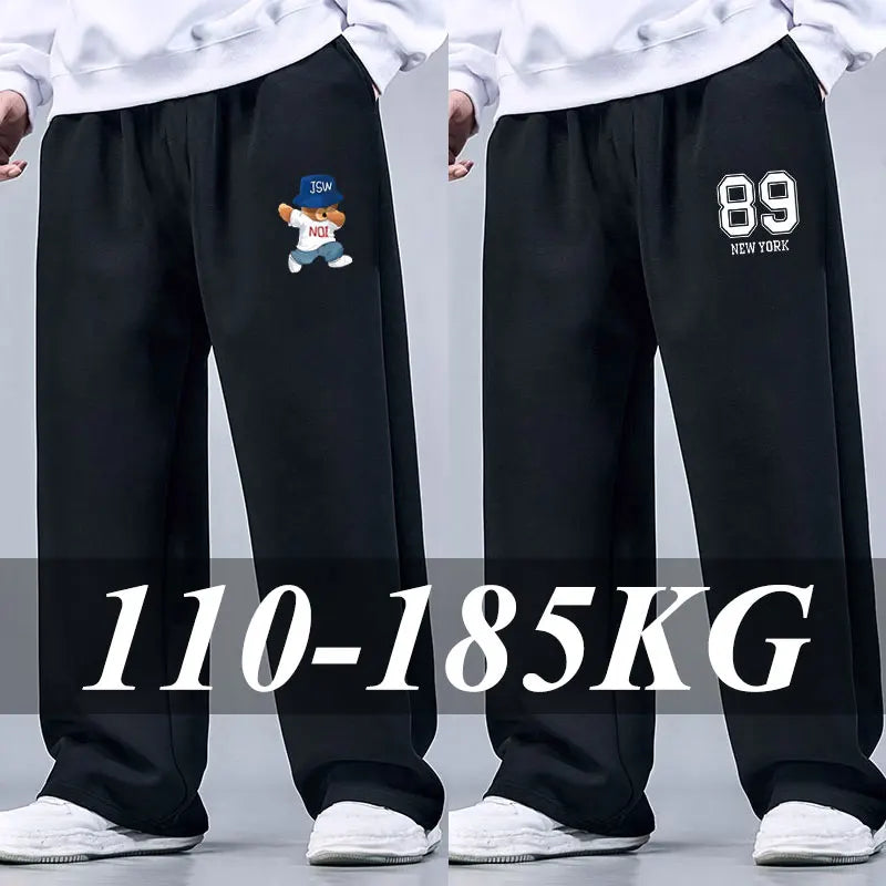 Black sweatpants with various designs and text on a gray background