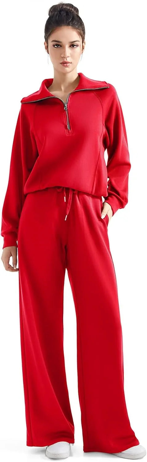 Woman wearing a red tracksuit on a white background