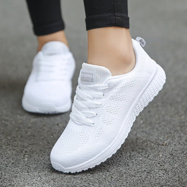 Women’s white mesh casual sneakers with breathable design and flat sole, ideal for walking, workouts, or everyday comfort wear. - 1