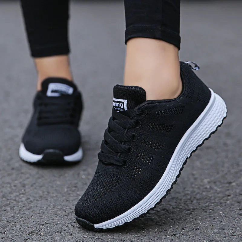 Women’s mesh casual sneakers with breathable design and flat sole, ideal for walking, workouts, or everyday comfort wear. - Black