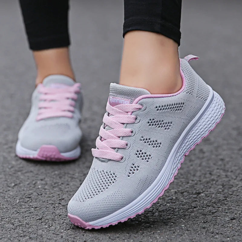 Women’s mesh casual sneakers with breathable design and flat sole, ideal for walking, workouts, or everyday comfort wear.- gray