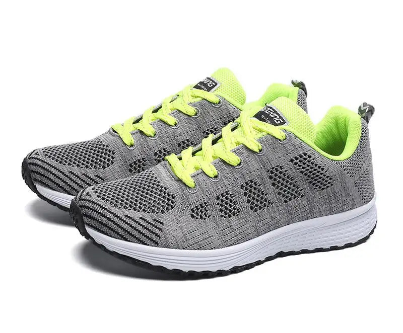 Women’s mesh casual sneakers with breathable design and flat sole, ideal for walking, workouts, or everyday comfort wear.- gray green